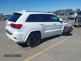 2015 Jeep Grand Cherokee Altitude with VIN 1C4RJEAG4FC815743, listed as a IAAI auction lot 41815095 with 106,867 mi miles. Bid and sale history available at carsss.com. Image 4.