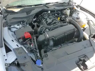 2025 Ford Mustang EcoBoost z VIN 1FA6P8TH4S5103665, wystawiony jako Copart lot #57855415 z przebiegiem 1 072 mil mil oraz Szkoda całkowita • Salvage title. Historia ofert i sprzedaży dostępna na DreamBid. Obrazek 16.