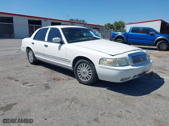 2007 Mercury Grand Marquis LS with VIN 2MEFM75VX7X623356, listed as a IAAI auction lot 41783361 with 157,921 mi miles. Bid and sale history available at carsss.com. Image 1.