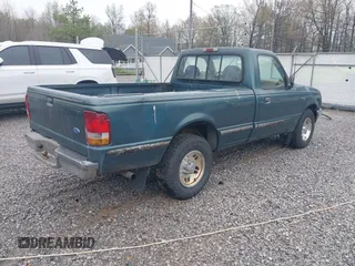 1995 Ford Ranger XLT with VIN 1FTCR10X9STA67218, listed as a IAAI auction lot 41952953 with 230,733 mi miles. Bid and sale history available at carsss.com. Image 4.