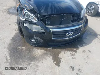 2013 Infiniti M with VIN JN1AY1AR6DM590187, listed as a IAAI auction lot 42096806 with 182,909 mi miles and . Bid and sale history available at DreamBid. Image 11.