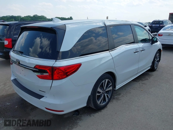 2023 Honda Odyssey Touring with VIN 5FNRL6H8XPB038875, listed as a IAAI auction lot 42441076 with 13,947 mi miles and . Bid and sale history available at DreamBid. Image 4.