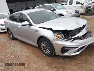 2020 Kia Optima LX z VIN 5XXGT4L37LG397003, wystawiony jako IAAI lot #41158379 z przebiegiem 129 743 mil mil oraz . Historia ofert i sprzedaży dostępna na DreamBid. Obrazek 1.