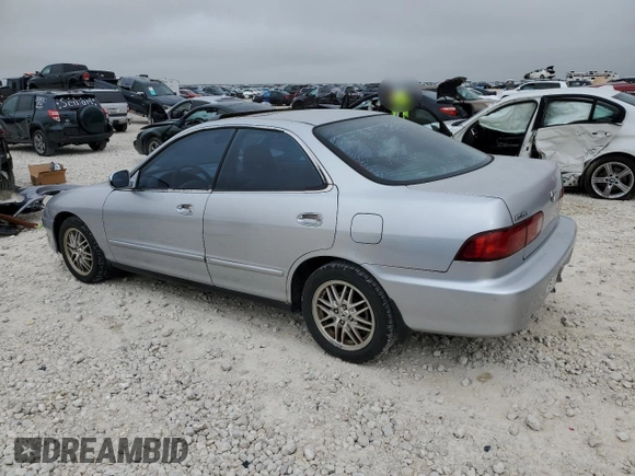 2001 Acura Integra LS z VIN JH4DB76571S000122, wystawiony jako Copart lot #68906974 z przebiegiem 162 045 mil mil oraz Czysty tytuł • Clean title. Historia ofert i sprzedaży dostępna na DreamBid. Obrazek 2.