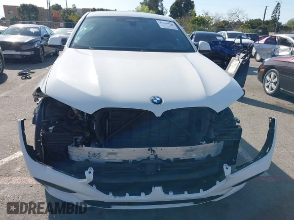 2022 BMW X6 M50i z VIN 5UXCY8C01N9J14882, wystawiony jako IAAI lot #41856966 z przebiegiem 22 893 mil mil oraz . Historia ofert i sprzedaży dostępna na DreamBid. Obrazek 6.