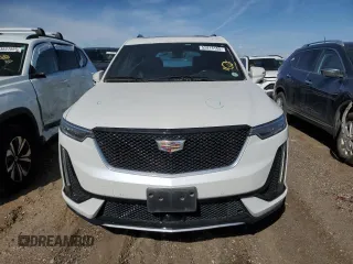 2020 Cadillac XT6 AWD Sport z VIN 1GYKPHRS7LZ109699, wystawiony jako Copart lot #52818155 z przebiegiem 60 105 mil mil oraz Nie do naprawy • Non repairable. Historia ofert i sprzedaży dostępna na DreamBid. Obrazek 5.