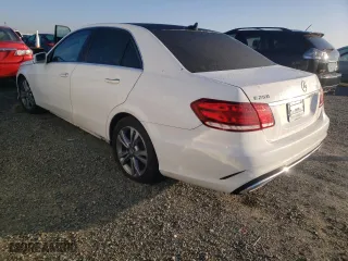 2015 Mercedes-Benz E-Class E 250 BlueTEC Luxury with VIN WDDHF9HB2FB128268, listed as a Copart auction lot 38828733 with 133,930 mi miles. Bid and sale history available at carsss.com. Image 2.