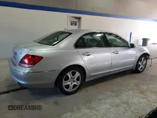 2008 Acura RL with VIN JH4KB16528C001848, listed as a Copart auction lot 42711235 with 156,055 mi miles and Salvage Title. Bid and sale history available at DreamBid. Image 3.
