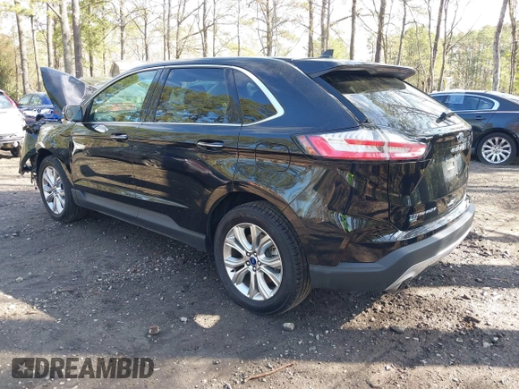 2022 Ford Edge Titanium with VIN 2FMPK4K95NBB06151, listed as a IAAI auction lot 41932545 with 57,762 mi miles and . Bid and sale history available at DreamBid. Image 3.