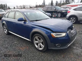 2014 Audi allroad Premium Plus with VIN WA1UFAFL4EA121651, listed as a IAAI auction lot 41579256 with 76,916 mi miles. Bid and sale history available at carsss.com. Image 1.