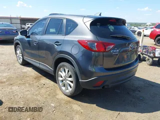2014 Mazda CX-5 Grand Touring with VIN JM3KE2DY8E0383206, listed as a IAAI auction lot 40205756 with 120,231 mi miles. Bid and sale history available at carsss.com. Image 3.