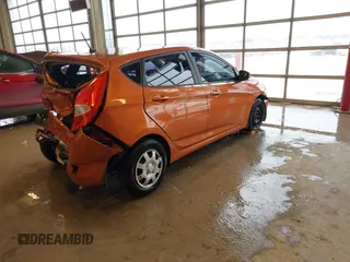 2015 Hyundai Accent GS with VIN KMHCT5AE6FU211955, listed as a IAAI auction lot 41610857 with 106,497 mi miles. Bid and sale history available at carsss.com. Image 4.