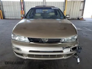1998 Nissan Maxima GXE с VIN JN1CA21DXWT527738, выставлен на аукционе Copart как лот 57276725 с пробегом 109 453 миль миль и Списание • Salvage title. История ставок и продаж доступна на DreamBid. Изображение 5.