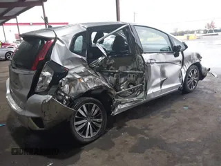 2015 Honda Fit EX-L with VIN 3HGGK5H82FM702649, listed as a IAAI auction lot 40931610 with 55,441 mi miles. Bid and sale history available at carsss.com. Image 4.