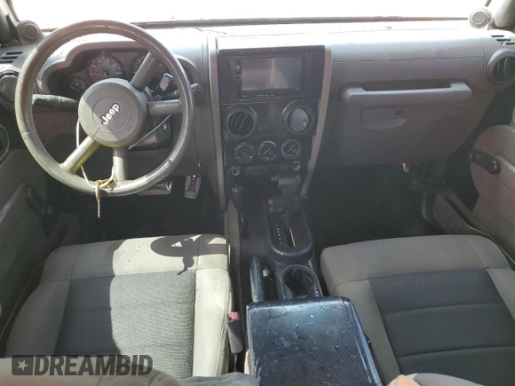 2008 Jeep Wrangler Unlimited X with VIN 1J4GA39118L633877, listed as a Copart auction lot 63652795 with 129,856 mi miles and Clean title. Bid and sale history available at DreamBid. Image 8.