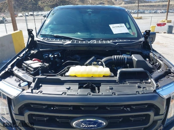 2021 Ford F-150 XL with VIN 1FTFW1E5XMFC81231, listed as a IAAI auction lot 41598484 with 29,840 mi miles. Bid and sale history available at carsss.com. Image 10.