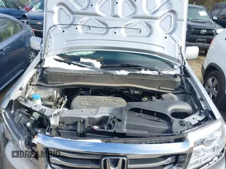 2014 Honda Pilot Touring with VIN 5FNYF4H9XEB038551, listed as a IAAI auction lot 41585720 with 150,725 mi miles and . Bid and sale history available at carsss.com. Image 10.