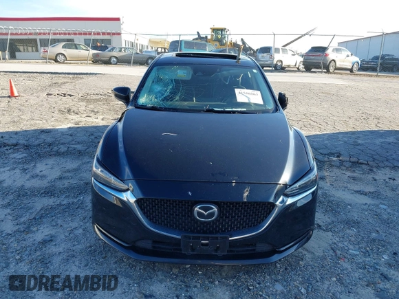 2018 Mazda Mazda6 Touring with VIN JM1GL1VM4J1307304, listed as a IAAI auction lot 41556563 with 173,739 mi miles. Bid and sale history available at carsss.com. Image 12.