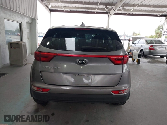 2019 Kia Sportage LX with VIN KNDPM3AC0K7561130, listed as a IAAI auction lot 41391657 with 152,728 mi miles and . Bid and sale history available at carsss.com. Image 16.