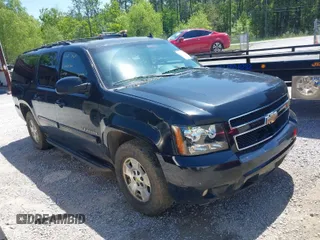 2011 Chevrolet Suburban LT with VIN 1GNSCJE09BR319675, listed as a IAAI auction lot 41966225 with 294,335 mi miles. Bid and sale history available at carsss.com. Image 1.