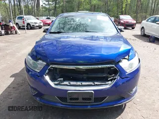 2013 Ford Taurus Limited z VIN 1FAHP2F85DG217232, wystawiony jako IAAI lot #41983750 z przebiegiem 117 696 mil mil oraz . Historia ofert i sprzedaży dostępna na DreamBid. Obrazek 12.