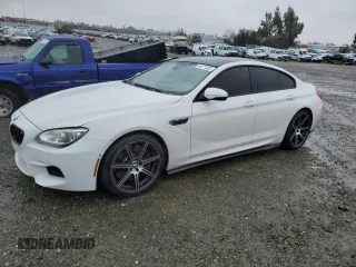 2015 BMW M6 z VIN WBS6C9C50FD467538, wystawiony jako Copart lot #44271625 z przebiegiem 65 326 mil mil oraz Czysty tytuł • Clean title. Historia ofert i sprzedaży dostępna na DreamBid. Obrazek 1.