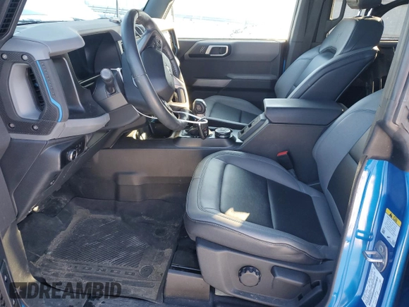 2023 Ford Bronco with VIN 1FMDE5BH0PLB15673, listed as a Copart auction lot 87823915 with 24,749 mi miles and Salvage Title. Bid and sale history available at DreamBid. Image 7.