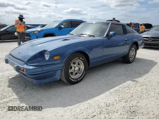 1982 Datsun 280ZX z VIN JN1HZ04S5CX457910, wystawiony jako Copart lot #77132604 z przebiegiem 261 383 mil mil oraz Szkody całkowita. Historia ofert i sprzedaży dostępna na DreamBid. Obrazek 1.