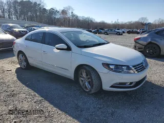 2014 Volkswagen CC Lux with VIN WVWRN7AN1EE506295, listed as a Copart auction lot 46024195 with 143,535 mi miles and Clean Title. Bid and sale history available at carsss.com. Image 4.