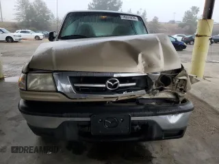 2001 Mazda B-Series 2WD Truck DS with VIN 4F4YR16U31TM00165, listed as a Copart auction lot 78331674 with 140,446 mi miles and Salvage Title. Bid and sale history available at carsss.com. Image 5.