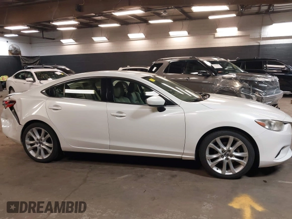 2014 Mazda Mazda6 i Touring with VIN JM1GJ1V68E1147067, listed as a IAAI auction lot 42105878 with 102,684 mi miles. Bid and sale history available at carsss.com. Image 13.