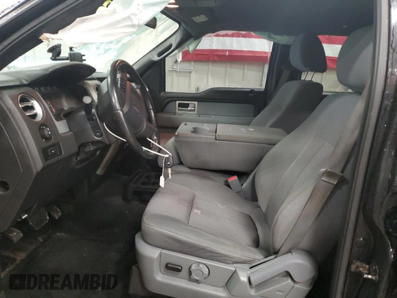 2011 Ford F-150 XLT with VIN 1FTFW1ET3BKE02555, listed as a Copart auction lot 51791675 with 206,065 mi miles and Salvage Title. Bid and sale history available at carsss.com. Image 7.