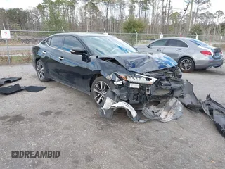 2019 Nissan Maxima Platinum z VIN 1N4AA6AV1KC363557, wystawiony jako IAAI lot #41614167 z przebiegiem 103 066 mil mil oraz . Historia ofert i sprzedaży dostępna na DreamBid. Obrazek 1.