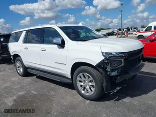 2023 Chevrolet Suburban Premier with VIN 1GNSCFKD9PR387180, listed as a IAAI auction lot 40433867 with 40,936 mi miles. Bid and sale history available at carsss.com. Image 1.