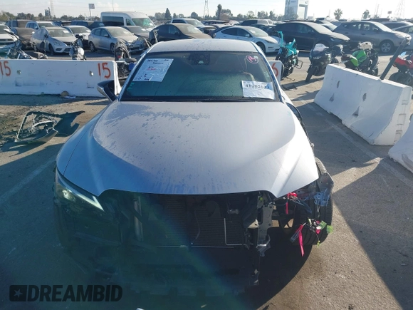 2021 Lexus IS with VIN JTHAA1D24M5117249, listed as a IAAI auction lot 41302623 with 32,540 mi miles. Bid and sale history available at carsss.com. Image 12.