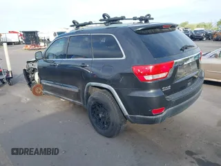 2011 Jeep Grand Cherokee 70th Anniversary with VIN 1J4RR4GG1BC588848, listed as a IAAI auction lot 42117042 with 168,273 mi miles. Bid and sale history available at carsss.com. Image 3.