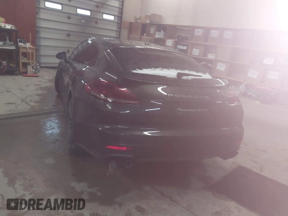 2014 Porsche Panamera GTS with VIN WP0AF2A73EL083133, listed as a IAAI auction lot 41945656 with 75,701 mi miles and . Bid and sale history available at DreamBid. Image 16.