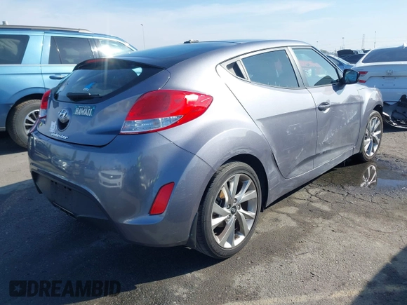 2016 Hyundai Veloster z VIN KMHTC6AD1GU286674, wystawiony jako IAAI lot #41627128 z przebiegiem 71 617 mil mil oraz . Historia ofert i sprzedaży dostępna na DreamBid. Obrazek 4.