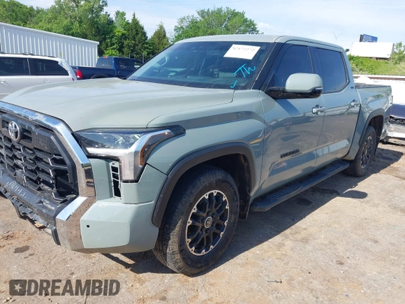 2022 Toyota Tundra SR5 with VIN 5TFLA5AB7NX013477, listed as a IAAI auction lot 42172272 with 30,460 mi miles and . Bid and sale history available at DreamBid. Image 2.