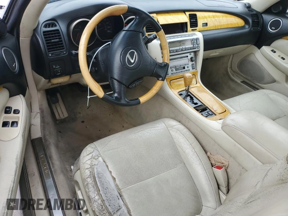 2003 Lexus SC 430 с VIN JTHFN48Y730040964, выставлен на аукционе Copart как лот 47684345 с пробегом 185 415 миль миль и Списание • Salvage title. История ставок и продаж доступна на DreamBid. Изображение 8.