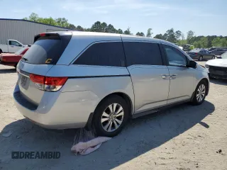 2015 Honda Odyssey EX-L with VIN 5FNRL5H66FB112090, listed as a Copart auction lot 52721475 with 120,472 mi miles and Salvage Title. Bid and sale history available at DreamBid. Image 3.