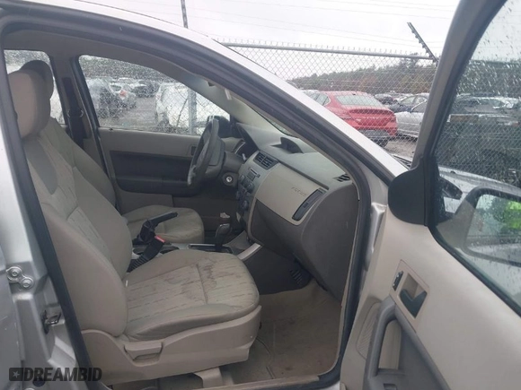 2009 Ford Focus SE with VIN 1FAHP35N69W233059, listed as a IAAI auction lot 41982131 with 108,616 mi miles. Bid and sale history available at carsss.com. Image 5.