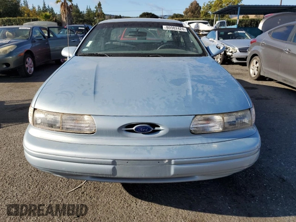 1993 Ford Taurus with VIN 1FACP5216PG197713, listed as a Copart auction lot 80982424 with 79,330 mi miles and Salvage title. Bid and sale history available at DreamBid. Image 5.
