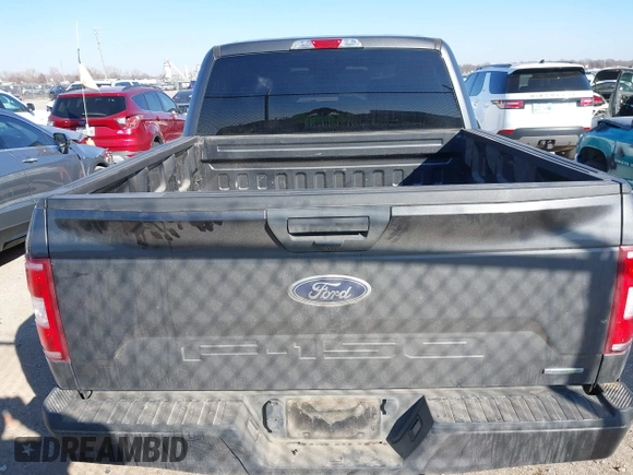 2019 Ford F-150 XL with VIN 1FTEW1CP4KKD69695, listed as a IAAI auction lot 41396598 with 103,855 mi miles and . Bid and sale history available at carsss.com. Image 16.