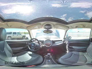 2012 MINI Hardtop with VIN WMWSU3C52CT369481, listed as a Copart auction lot 56030045 with 146,546 mi miles and Salvage title. Bid and sale history available at DreamBid. Image 14.