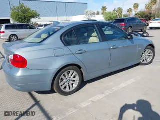 2007 BMW 3 Series 328i with VIN WBAVA33517PG53028, listed as a IAAI auction lot 41988342 with 51,099 mi miles. Bid and sale history available at carsss.com. Image 4.