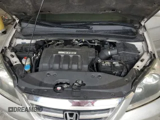 2007 Honda Odyssey EX with VIN 5FNRL38477B429624, listed as a Copart auction lot 53961825 with 144,957 mi miles and Salvage Title. Bid and sale history available at DreamBid. Image 12.