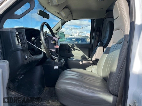 2021 Chevrolet Express Cargo with VIN 1GCWGBFP0M1206747, listed as a Copart auction lot 82701894 with Not provided miles and Salvage title. Bid and sale history available at DreamBid. Image 7.