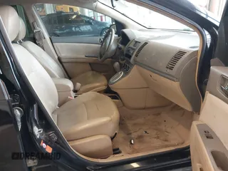 2007 Nissan Sentra 2.0 z VIN 3N1AB61E27L655448, wystawiony jako IAAI lot #41587772 z przebiegiem 184 202 mil mil oraz . Historia ofert i sprzedaży dostępna na DreamBid. Obrazek 5.