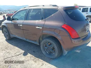 2003 Nissan Murano SL with VIN JN8AZ08W03W218075, listed as a IAAI auction lot 42158632 with 127,762 mi miles and . Bid and sale history available at DreamBid. Image 3.